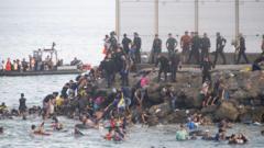 Spain&rsquo;s PM blames traffickers after 60,000 migrants reach Ceuta from Morocco